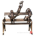 Bronze outdoor monkey statues playing musical instrument